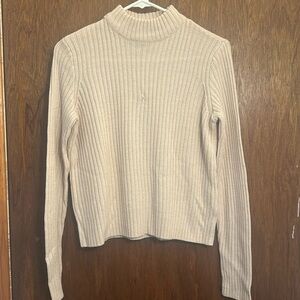 pale pink knitted sweater
